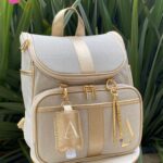 Mochila maternidade alças fixas - Linho Cru + Dourado